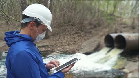 Environmental pollution radiation waste concept . man chemist scientist in a Stock Footage 130444892