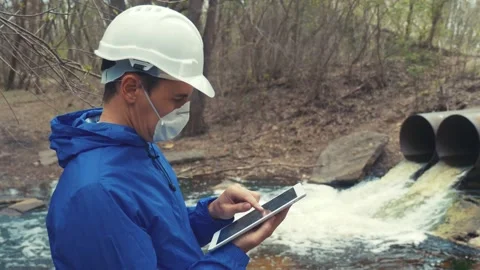 Environmental pollution radiation waste concept . man chemist scientist in a Stock Footage 130444952
