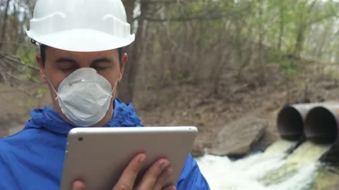 Environmental pollution radiation waste concept . man chemist scientist in a Stock Footage 130444972