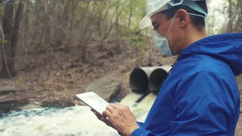 Environmental pollution radiation waste concept . man chemist scientist in a Stock Footage 131714705