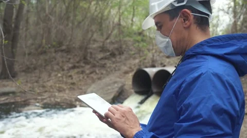 Environmental pollution radiation waste concept . man chemist scientist in a Stock Footage 132219136