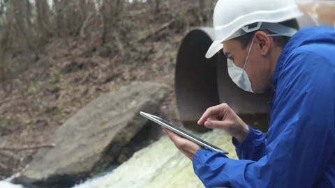 Environmental pollution radiation waste concept . man chemist scientist in a Stock Footage 149998183