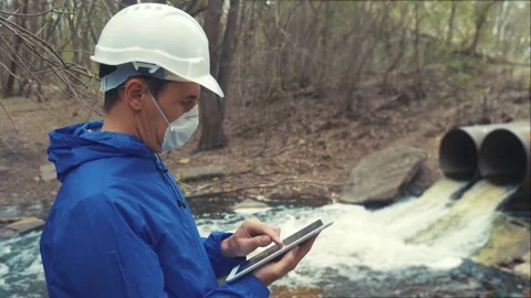 Environmental pollution radiation waste concept . man chemist scientist in a Stock Footage 164858554