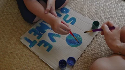 Environmental problems, draws a poster to demonstrate environmental activists Stock Footage 255229929