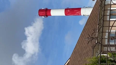 Environmental problems. smoke from the chimney against the blue sky Video stock 196011819