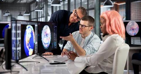 Environmental Scientist Leads Team Analyzing Climate Change Data On Screen. Stock Photos