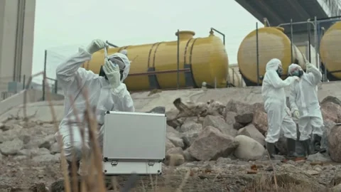 Environmental Scientist Testing Soil in Hazard Zone Slow-Mo Stock Footage 320503881