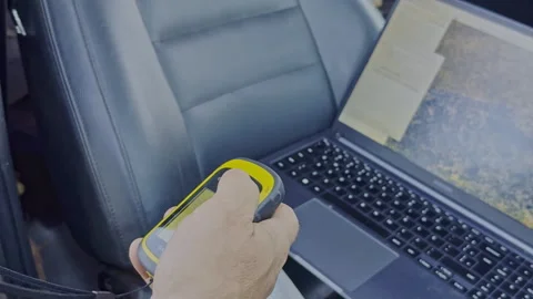 Environmental Surveyor Recording Field Data Using Handheld GPS Receiver Stock Footage 339998392