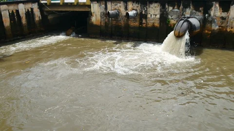 Environmental Video After a heavy rain the sewer system of the big city is dr Video stock 95989764