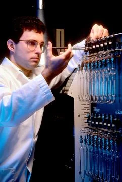 Environmental worker preforming a test. Image shot 2004. Exact date unknown. Stock Photos