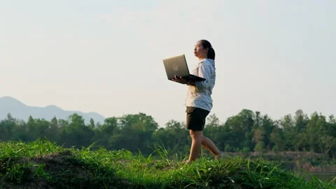 Environmentalist analyzing water test results using application on laptop. Stock Footage 241637666