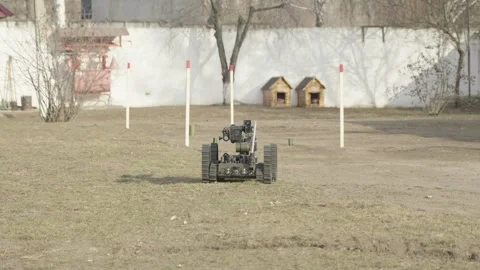 EOD, sapper robot for remote explosive ordnance disposal Stock Footage 304089625