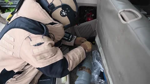 EOD soldier checking explosive device during EOD training Stock Footage 161955592
