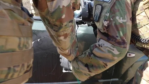 EOD soldiers attach improvised explosive device to vehicle during IED training Stock Footage 111947792