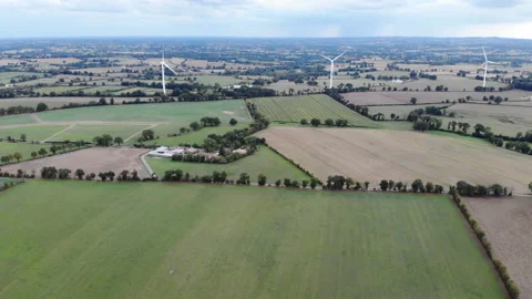 Eolian generators in a beautiful wheat field. eolian turbine farm. Wind turbine, Stock Footage 142060741