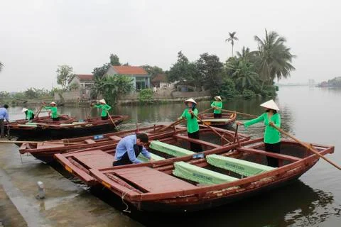 Eople boating in the river Stock Photos