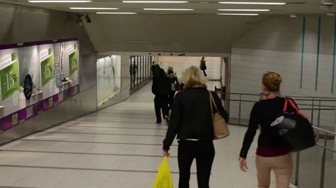 Eople walking in a corridor in the main railway station in Helsinki Stock Footage 49829546