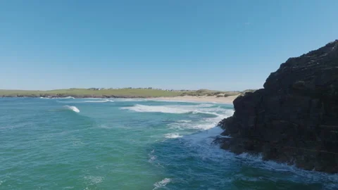 Eoropie cliffs and waves breaking along the coast, Isle of Lewis, Outer Hebrides Stock Footage 320454359