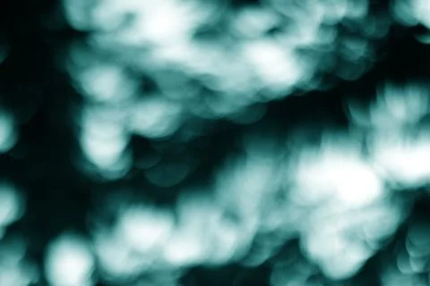 Ephemeral Aqua Luminescence The Dance of Light and Shadow Abstract Bokeh Stock Photos