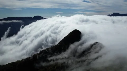 Epic 4K Aerial Sea of Clouds and Flowing Cloud Waterfall Mt Kamegamori Japan Vídeo Stock 344841725