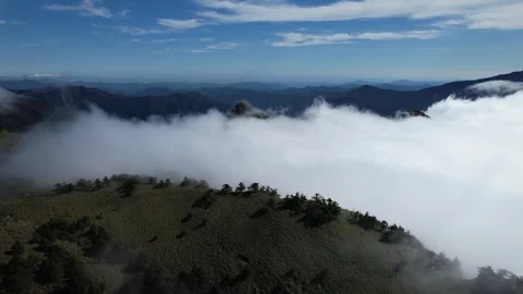 Epic 4K Aerial Sea of Clouds and Flowing Cloud Waterfall Mt Kamegamori Japan Video stock 344841812