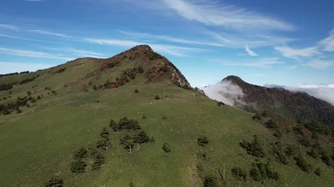 Epic 4K Aerial Sea of Clouds and Flowing Cloud Waterfall Mt Kamegamori Japan Video stock 344841815