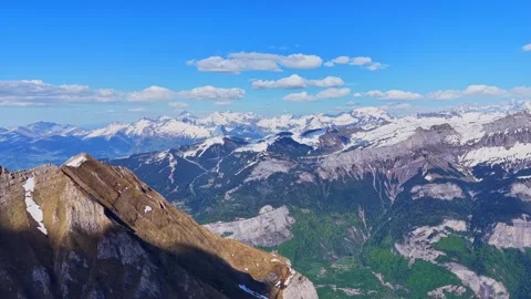 Epic 4K Drone Flight Above Snowy Alpine Mountains Stock Footage 334776828