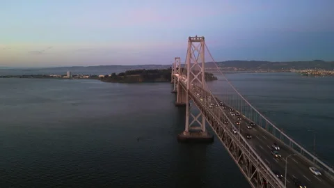 Epic 4K Drone Over San Francisco Bay Bridge at Sunset w/Treasure Island Stock Footage 274109027