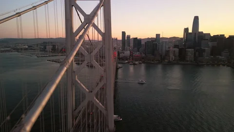 Epic 4K Drone Over San Francisco Bay Bridge at Sunset w/Cityscape Stock Footage 274109456