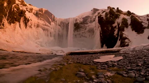 Epic 4K time lapse of a waterfall called Skogafoss in Iceland during a sunset. Stock Footage 231347784