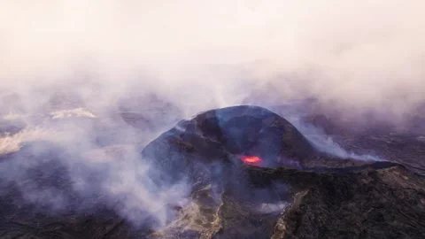 Epic Aerial Active Volcano Iceland Smoking Lava Ash Foggy Low Clouds Moody Evil Stock Footage 256714849