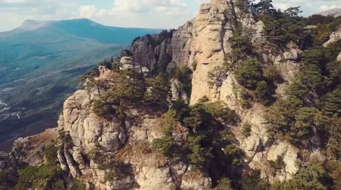 Epic aerial of cliffs and spruce forest, aerial, fir, fir-tree, mountain Stock-Footage 57260326