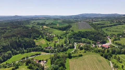 Epic aerial countryside panorama of patchwork fields, vineyards, rolling hi.. Stockfoto's