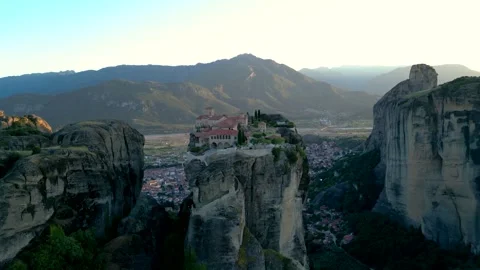 Epic Aerial Drone Monastery of Holy Trinity Sunset in Meteora, Greece. Fly .. Stock Footage 334893642