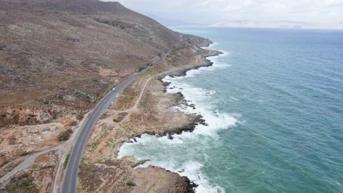 Epic aerial drone shot of cloudy mountain coastline highway background. Stock Footage 168254110