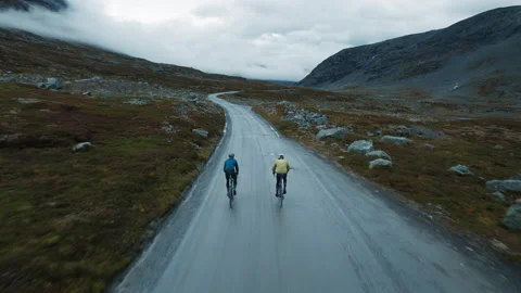 Epic aerial drone shot of two cyclists exploring Stock-Footage 185673339