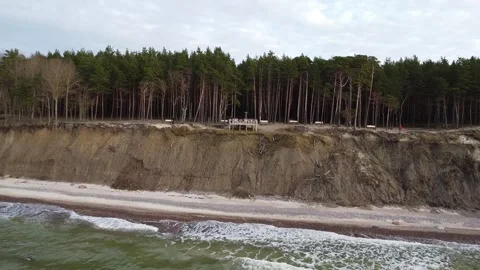 Epic Aerial Flight from Cliffside to Baltic Coastline Stock Footage 323613041