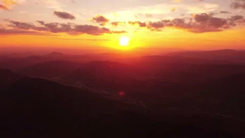 Epic aerial flight in the clouds at sunset. Golden hour, colorful clouds. Stock Footage 201160070