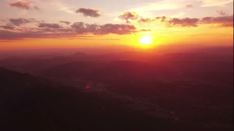 Epic aerial flight in the clouds at sunset. Golden hour, colorful clouds. 4K Stock-Footage 201166235