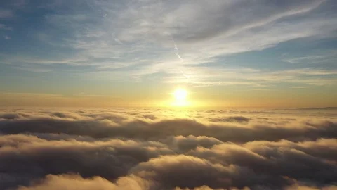 Epic Aerial Flight Over the clouds during the sunrise Stock Footage 126963311
