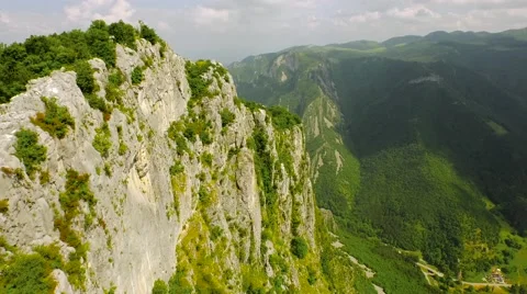 Epic Aerial Fly Over Cliffs And Mountains High Altitude Beautiful Mountain Range Stock Footage