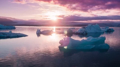 Epic Aerial Flyover Floating Arctic Ice Melting In A Beautiful Ice Lake Purple Stock Footage