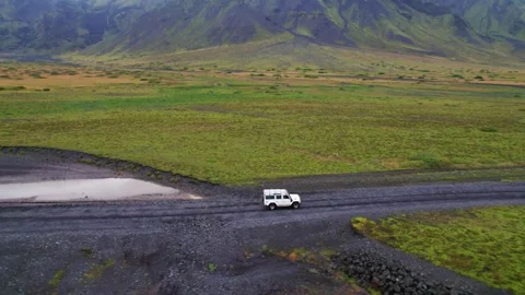 Epic Aerial Follow Side Angle White 4x4 Car Long Drone Shot Along Dirt F-Road Stock Footage 257052299