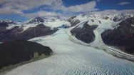 Epic Aerial Glacier And Rugged Mountains Stock Footage