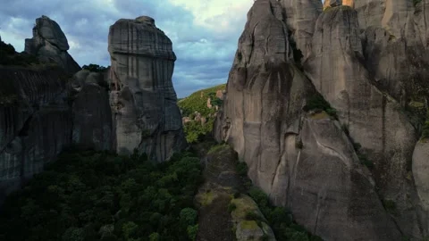 Epic Aerial Long Flight Through Rocks to Reveal Great Meteoron Monastery at.. Stock Footage 334893394