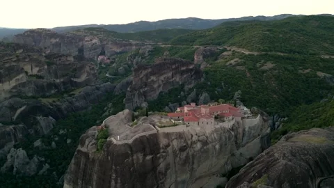 Epic Aerial Monastery of Holy Trinity Sunset in Meteora, Greece. Fly Close .. Stock Footage 334893435