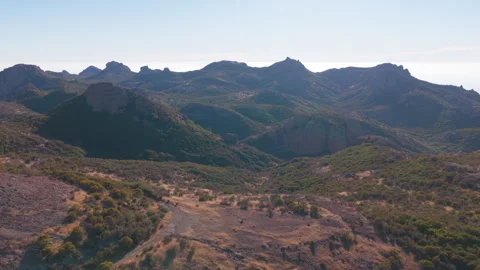 Epic aerial over lush rolling hills near Sandstone Peak in the Santa Monica Stock Footage 345528517