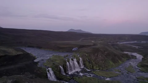 Epic Aerial River Crossing Driving Over Waterfall Iceland. Drone Spins Stock Footage 258492069