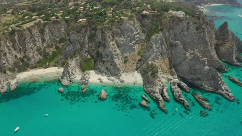Epic Aerial shot of cliffs and blue sea in Calabria Italy IT CAL DJI 0461 C GR Video stock 143296437