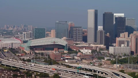 Epic aerial shot of Downtown Houston Texas and the Minute Maid Park Stadium 4 Stock Footage